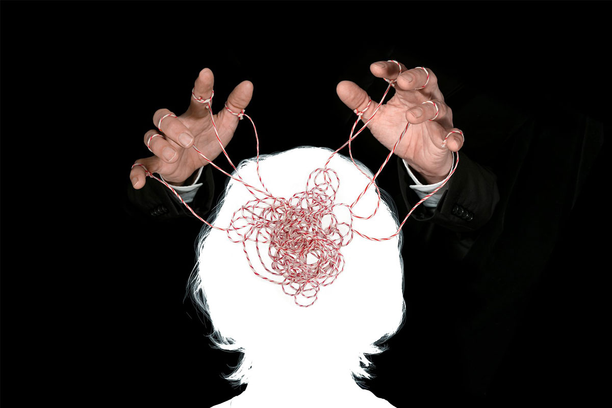 Silhouette being pulled by strings like a puppet. Credit: TSViPhoto/Shutterstock