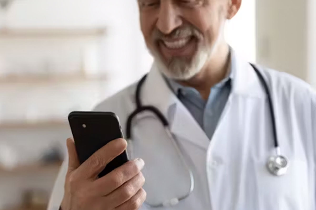 Doctor using AI to help build vaccine confidence. Credit: Shuttershock