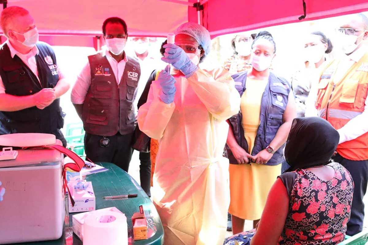 A health worker prepares to administer the first dose of IAVI’s Sudan virus vaccine as part of a ring vaccination trial launched in response to an outbreak of Sudan virus disease in Uganda. Credit: WHO