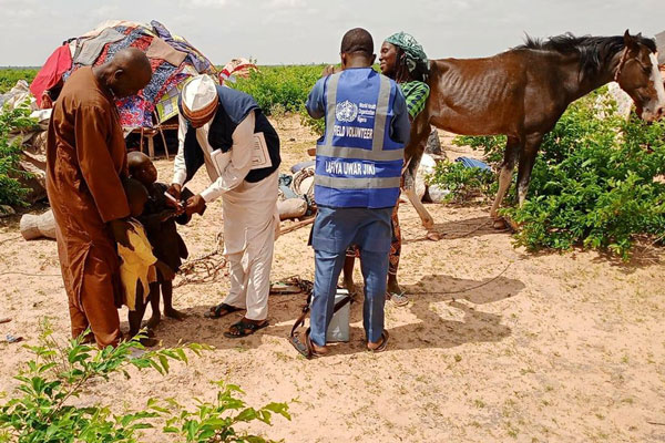 To tackle vaccine inequity, the Katsina State Government sends health workers on motorcycles to nomadic camps scattered across the state. Credit: Katsina State Primary Health Care Agency (KSPHCA)