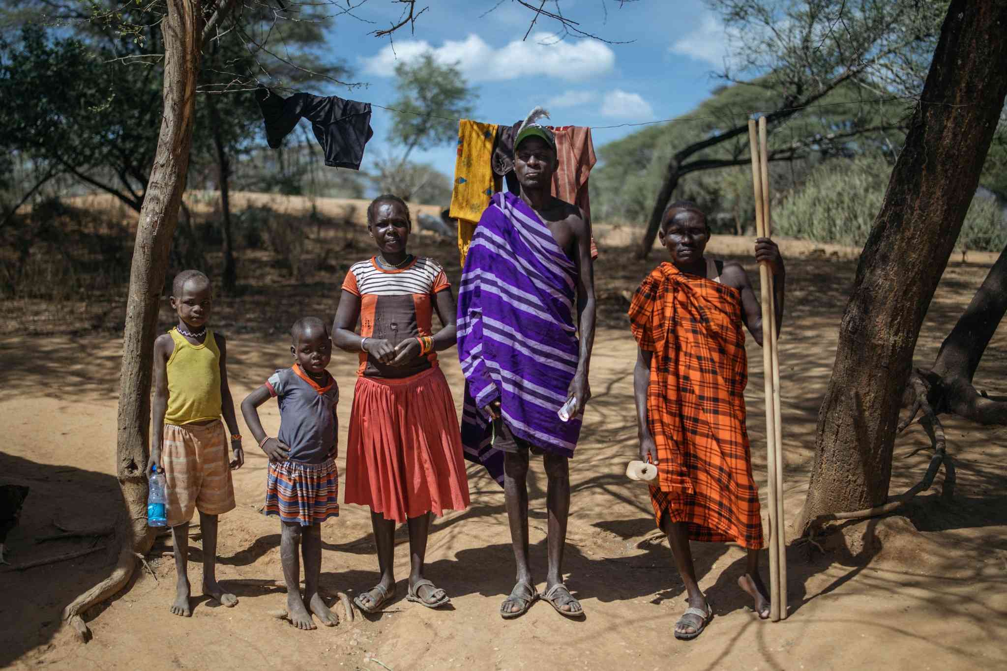 Pkiror Adumgudung (in purple), who recovered from Kala-azar at Amudat Hospital last year, at home with his family in Narukum village in West Pokot. Credit: Kang-Chun Cheng