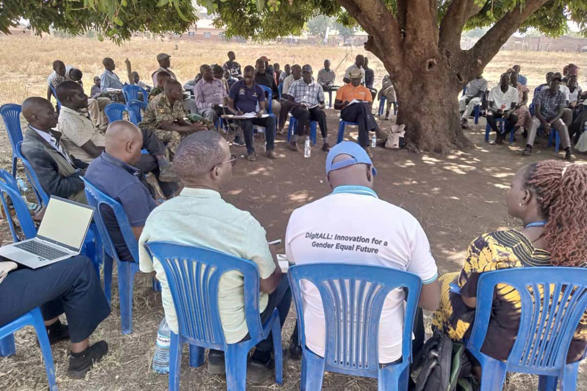 A team of health workers, village health teams (VHTs), and other community leaders meeting in Agoro to figure out how to stop cholera after the disease killed a woman. Credit: Denis Ocula