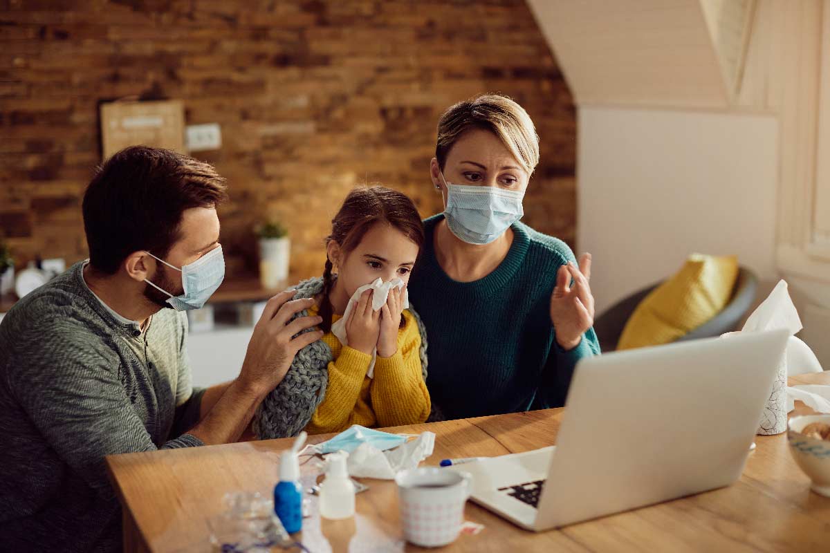 Worried family having video call with a doctor from home during coronavirus pandemic. Credit: Drazen Zigic/Freepik