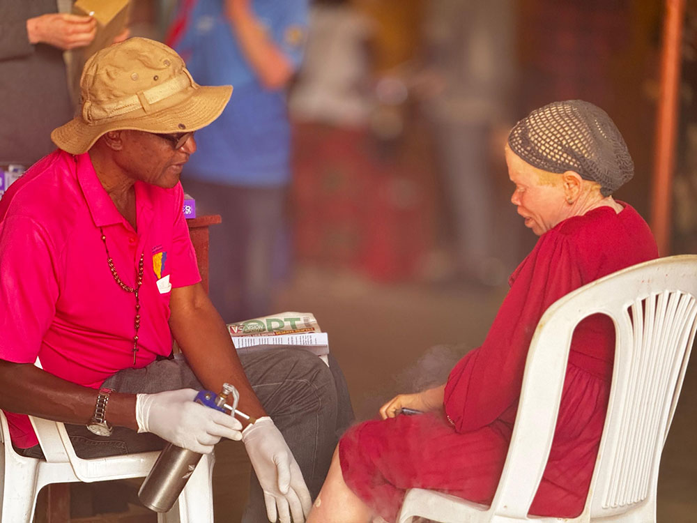 A dermatologist examining a member of SNUPA as one of the activities that bring free health services closer to its members. Credit: SNUPA