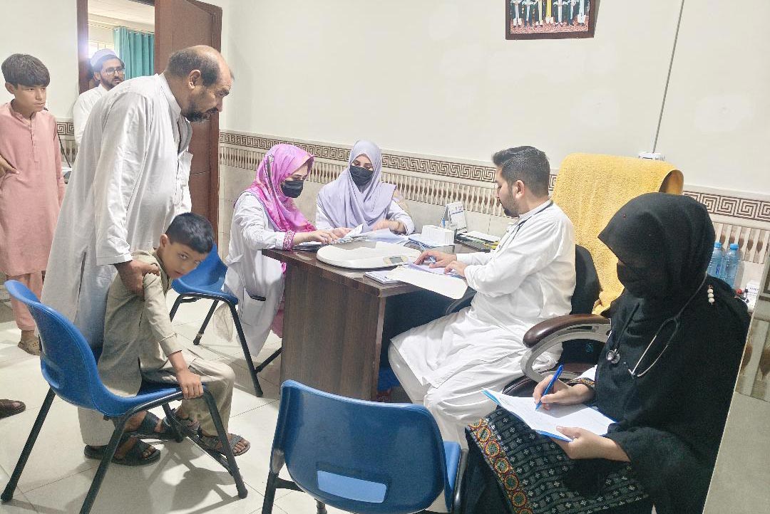 A team of neuro paediatricians and trainee doctors examining patients of Subacute Sclerosing Panencephalitis (SSPE), at a medical camp organised by the Al-Khidmat Foundation on September 6, 2026. Credit: Al-Khidmat Fo