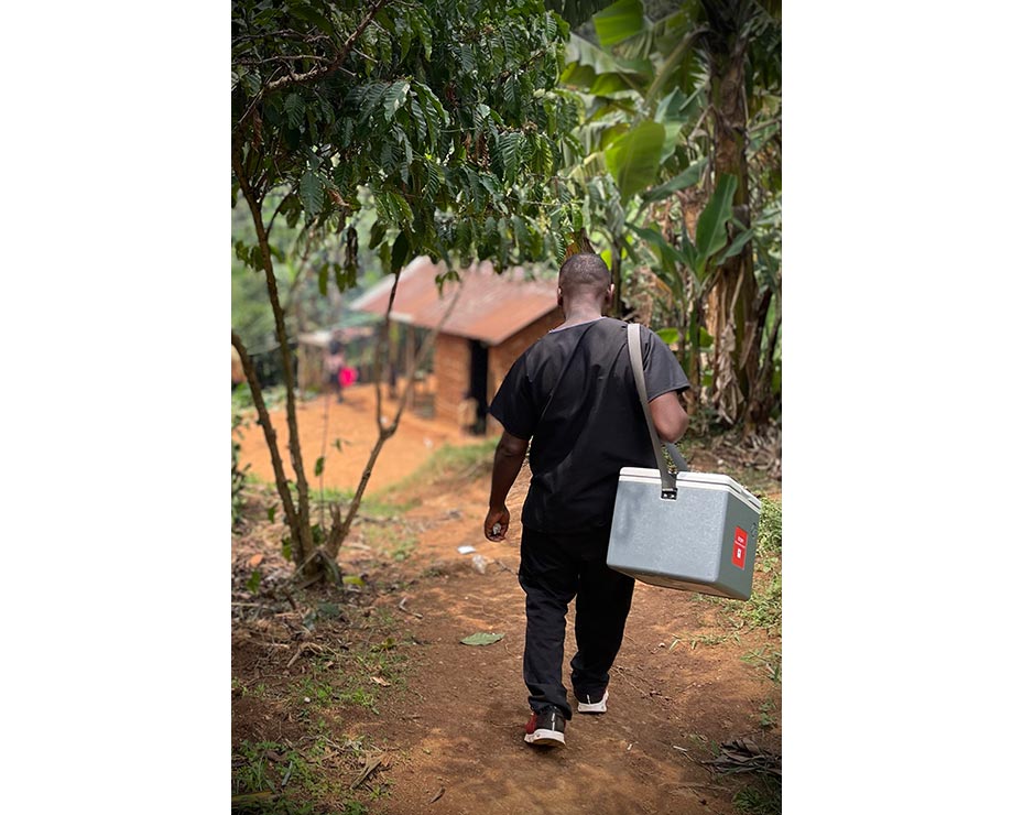 Andisa walks to the indigenous people’s settlement in southwestern Uganda in search of ZDC on January 13. Credit: John Agaba
