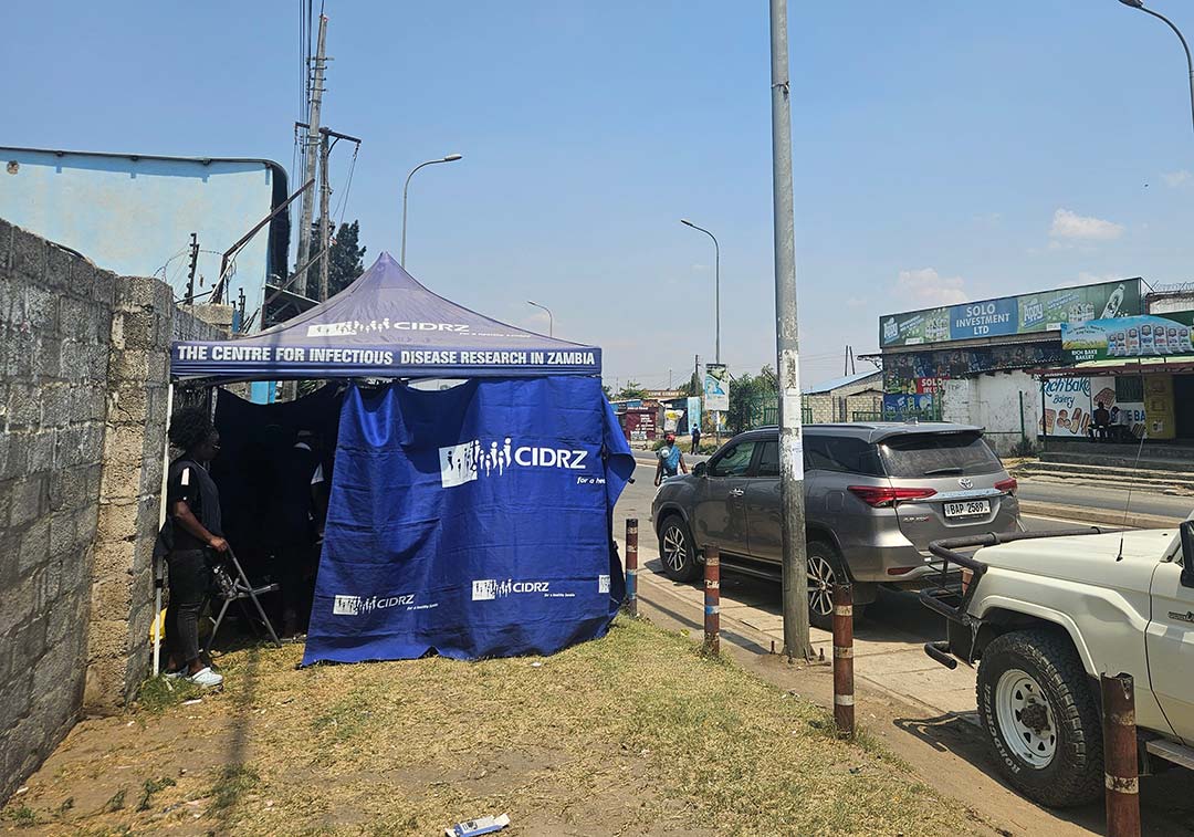 Data collection team at a community collection site at a bus station in Lusaka. Credit: Seke Muzazu