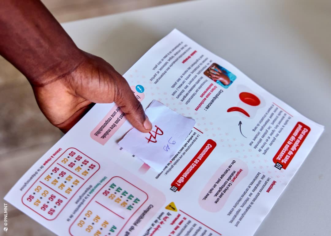 A leaflet explains sickle cell disease, an inherited blood disorder that is particularly common among people of African genetic descent. Credit: Programme national de lutte contre les maladies non transmissibles