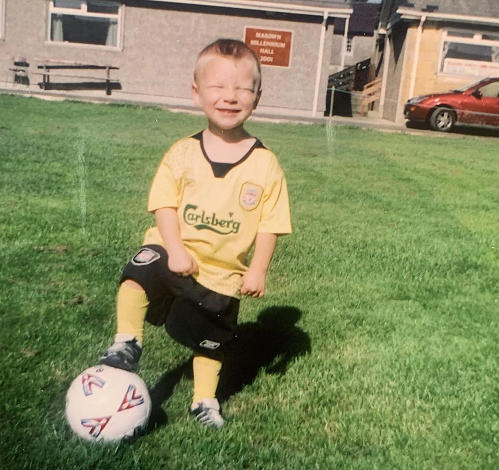 Lucas Martin playing football
