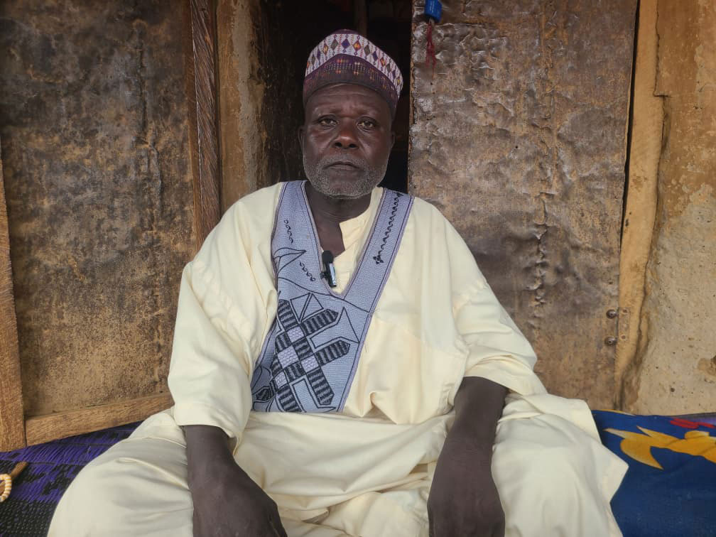 Mallam Ibrahim Naibi, the assistant chief imam of Koya Village seated in his home to speak with VaccinesWork. Credit: Abdullahi Muritala