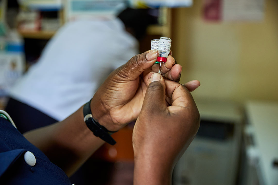 A nurse in Kenya draws up a shot of malaria vaccine. Gavi/White Rhino Films-Lameck Orina