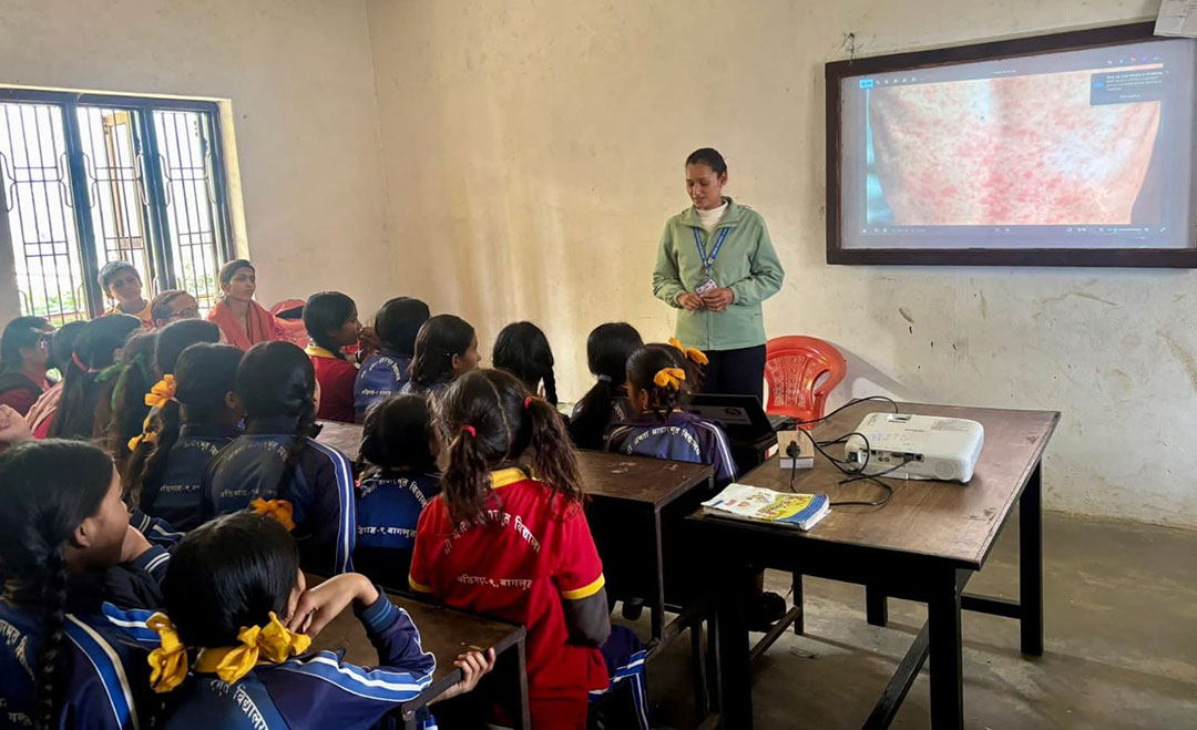 A class of schoolchildren are taught about the importance of measles vaccination. Credit: Nepal National Immunization Program