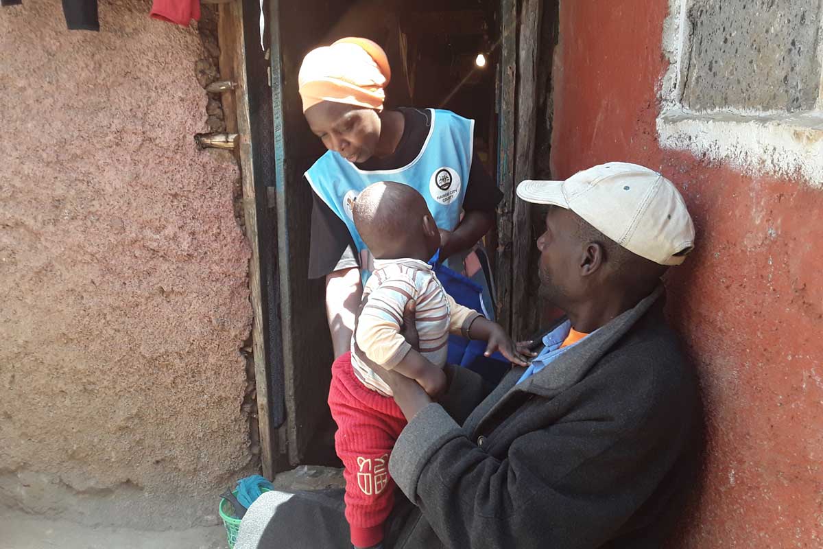Health experts say fathers can break gender barriers to immunisation by participating in health visits, challenging the notion that vaccination is solely a mother's responsibility and raising their own awareness. Credit: Joyce Chimbi.
