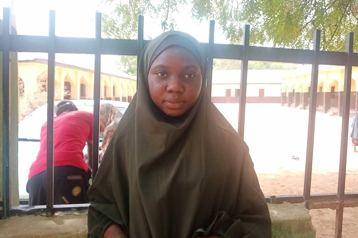 Fatima Hassan, Assistant Health Records and Information Officer, works with community mobilisers and data systems to track and improve immunisation coverage. Credit: Jesusegun Alagbe