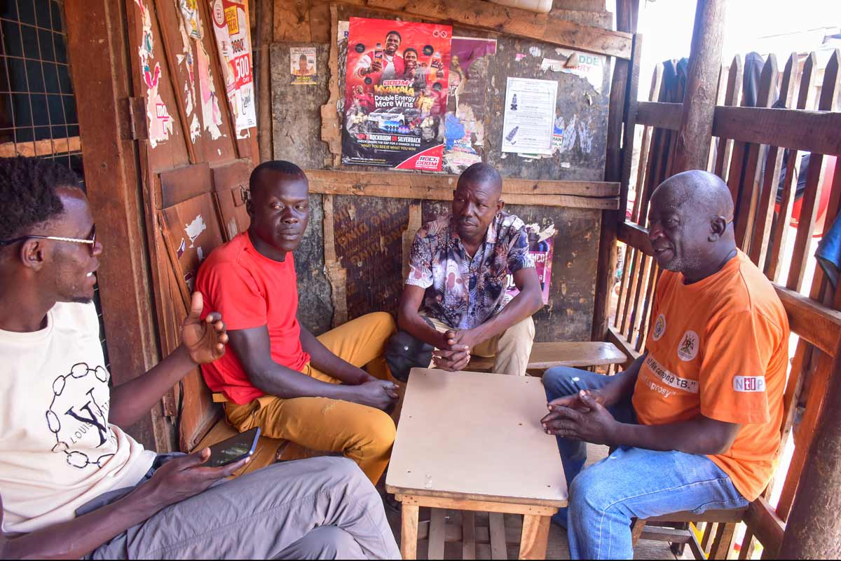 Martin Onyuthi Uma responds to questions from young men regarding how safe vaccines are and other queries during a Q&A session. Credit: John Musenze.