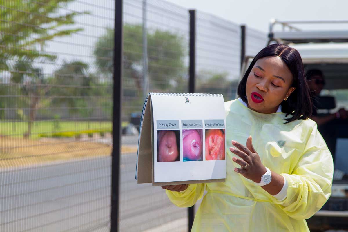 A nurse talks through cervical cancer clinical images. Credit: CIDRZ Zambia
