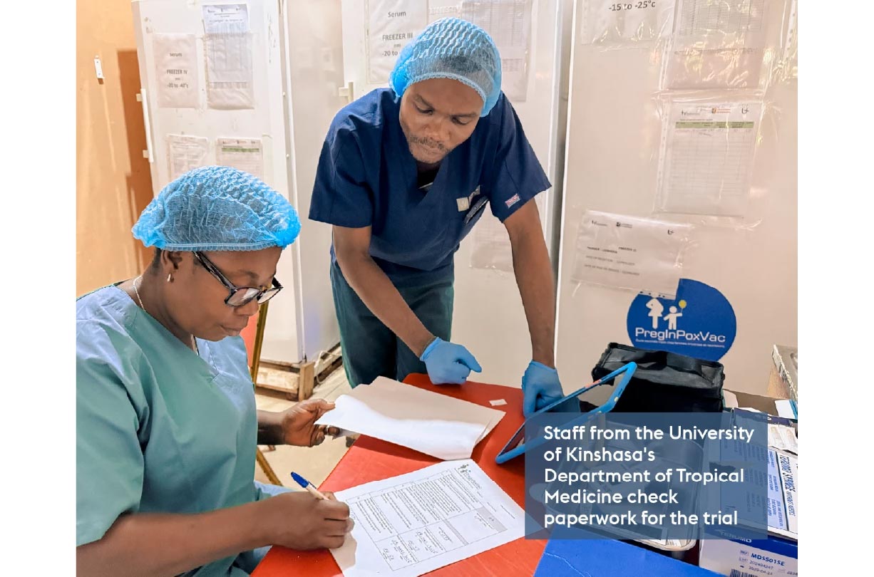 Staff from the University of Kinshasa's Department of Tropical Medicine check paperwork for the trial
