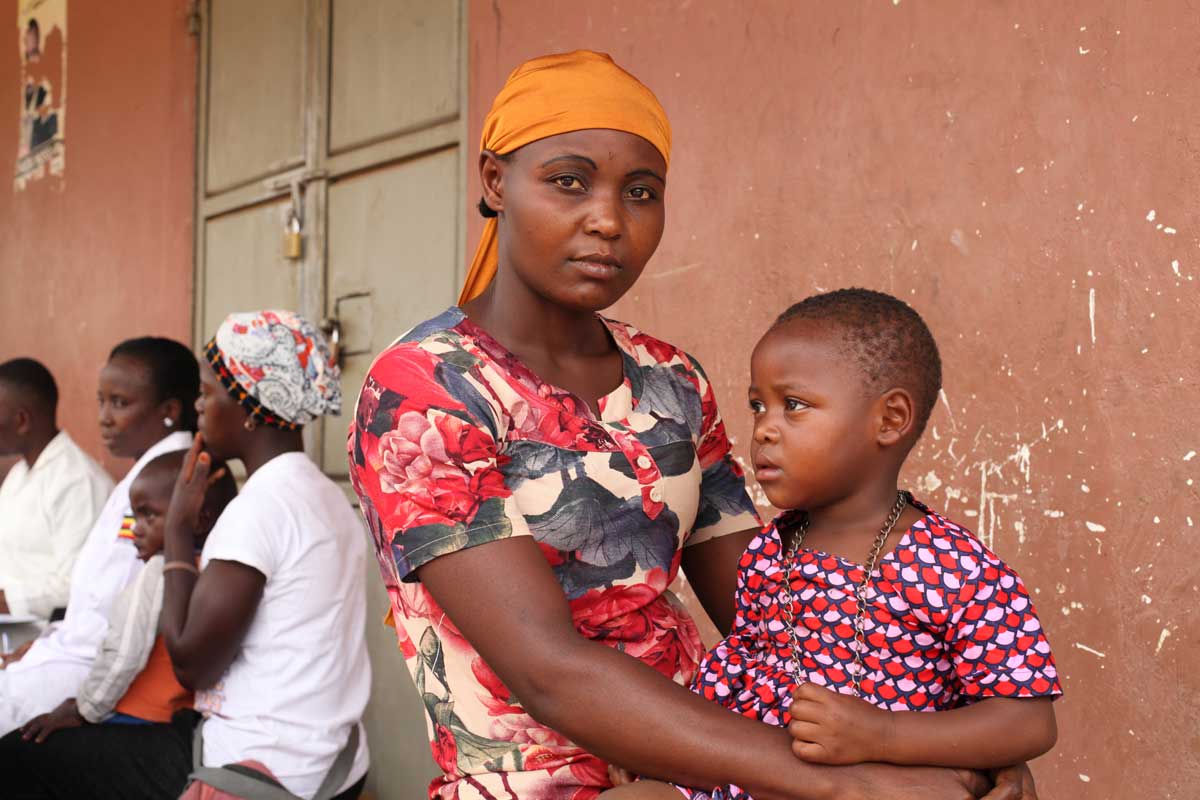 Sumayiya Namboozo a mother of five at Webuta village waiting for 17 month baby to be vaccinated from malaria for the 3rd dosage. Credit: John Musenze
