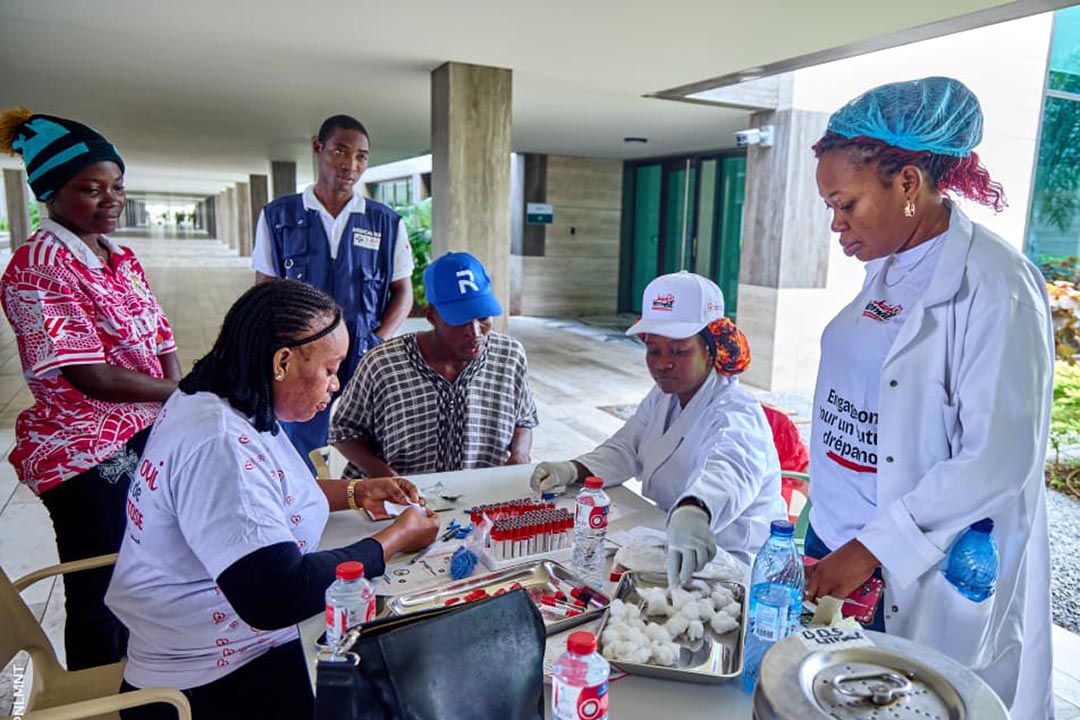 As part of "Juin Vermeil" – vermilion June, the national month of sickle-cell disease awareness - health workers in Benin screen blood samples to test for the sickle cell trait. Credit: Programme National de Lutte contre les Maladies Non Transmissibles