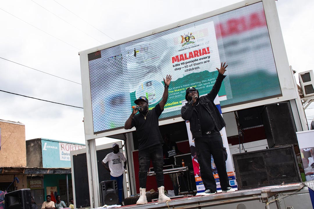 Madrat and Chiko promoting the malaria vaccine in Mukono district. Credit: Madrat and Chiko