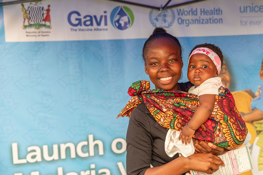 A mother taking her baby for malaria vaccination in Mansa, Zambia. Credit: UNICEF