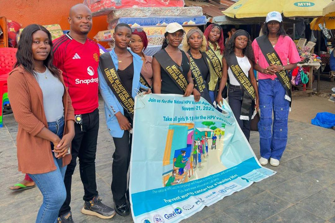 The Most Beautiful Girls Liberia contestants at a local market after engaging market people on the importance of the HPV vaccine. Credit: Tina S. Mehnpaine