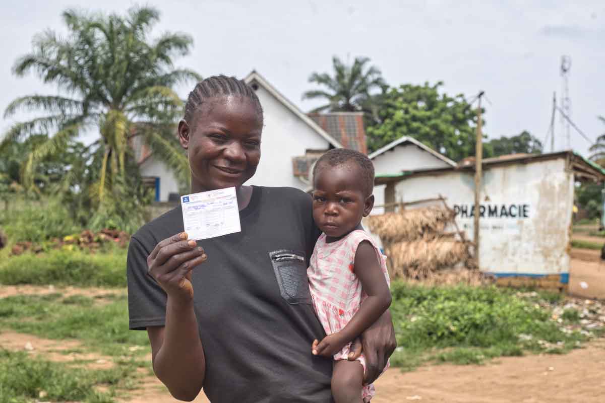 A mother with her baby after being vaccinated in Maidombe, DRC. Credit: VillageReach/Carlo Lechea