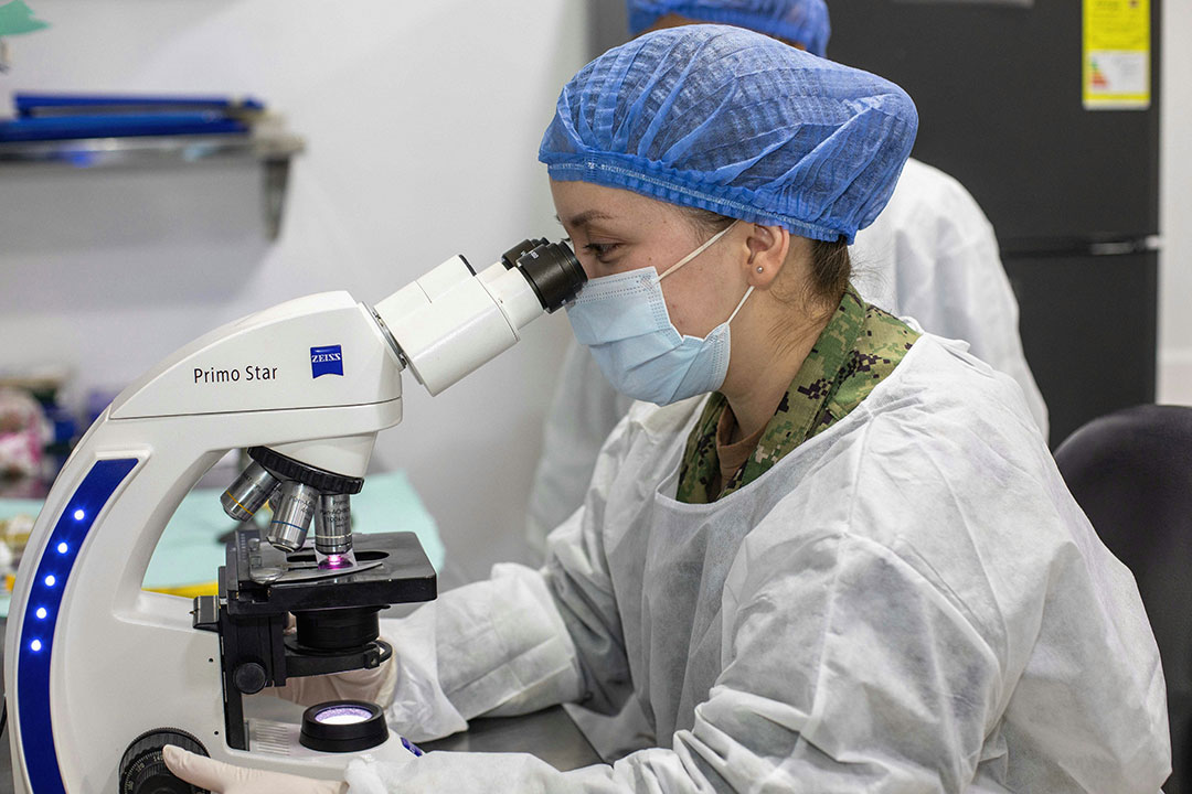 Female scientist. Photo by Navy Medicine on Unsplash