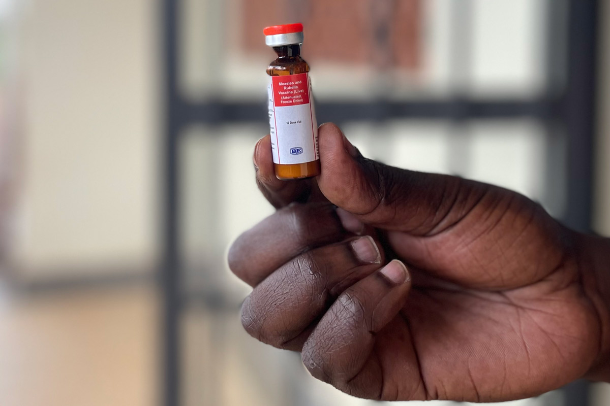 A vial of the MR vaccine. Vaccines helped stop measles, a deadly and contagious disease, in rural Uganda. Credit: John Agaba