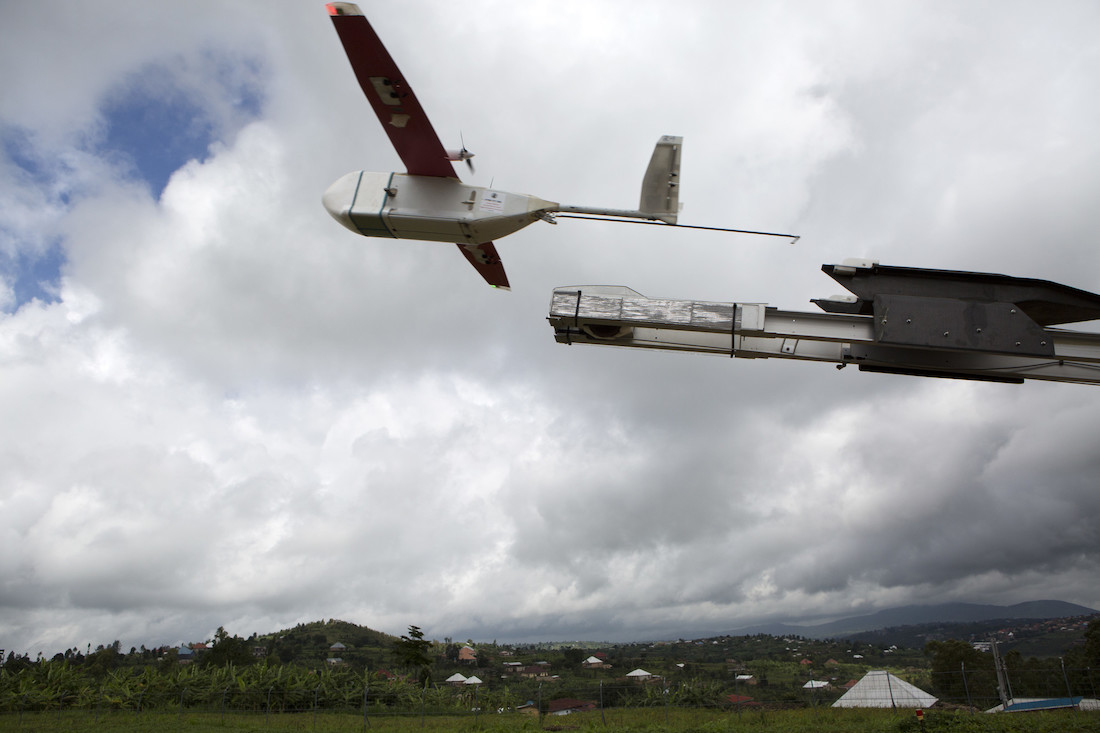 A drone being launched to deliver vaccines to remote communities